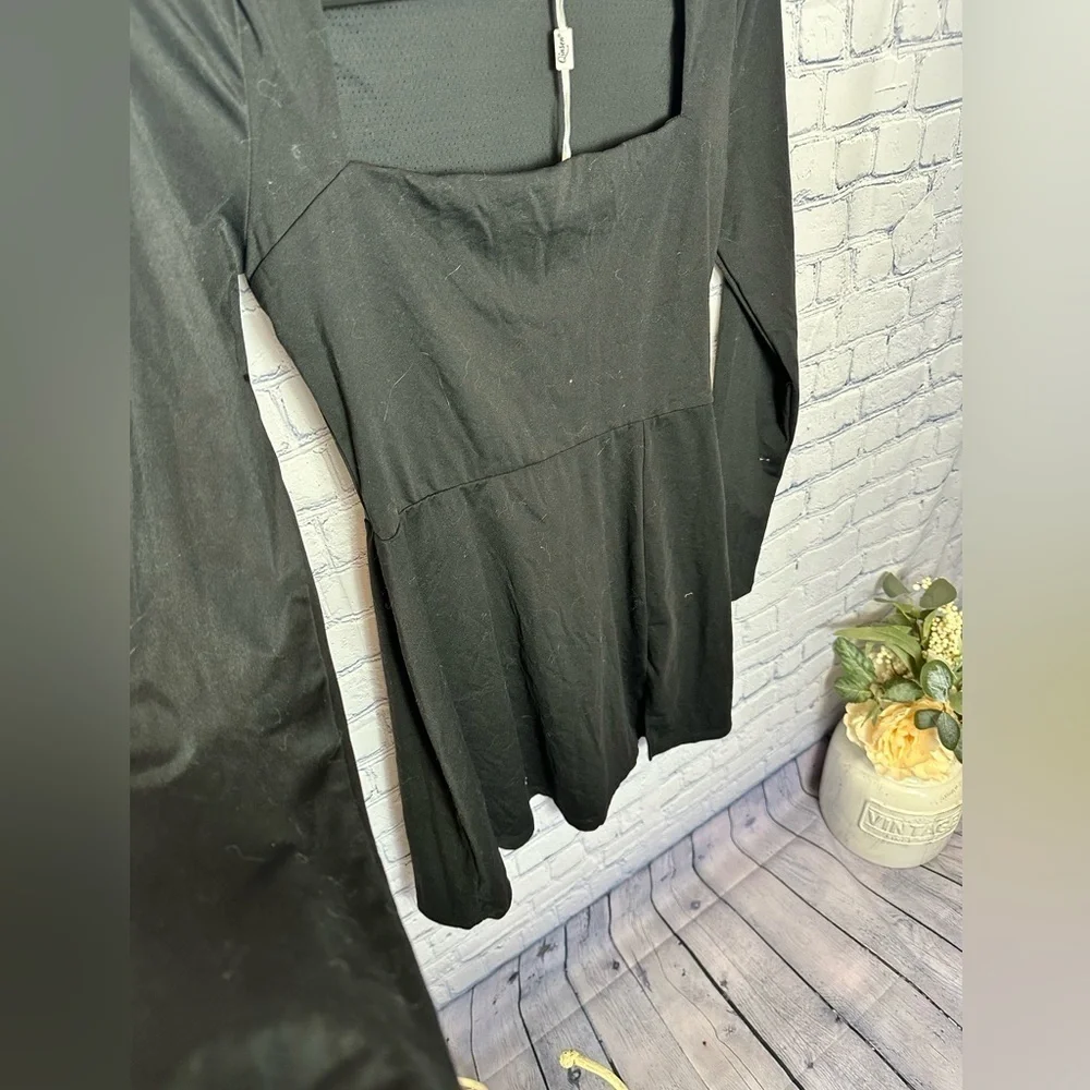 Be the Life of the Party with Quinsen’s Sexy Black Peplum Dress - Picture 3 of 6